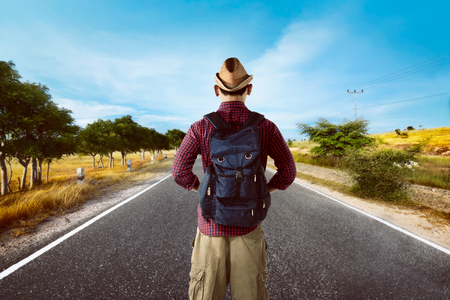 Image of handsome asian man wearing hat travel aloneの写真素材