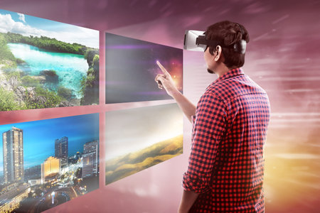 Young asian man wear VR headset get into virtual reality world