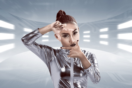 Young pretty asian woman inside digital world. Virtual reality conceptの写真素材