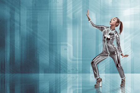 Young pretty asian woman inside digital world. Virtual reality conceptの写真素材