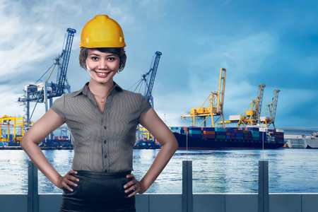 Asian business woman wearing hardhat over port background