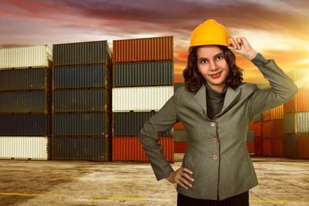 Woman wearing a yellow helmet was a photo in the harbor