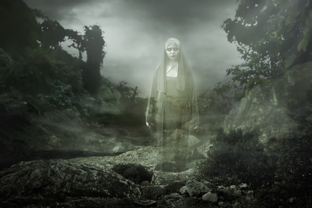 Scary devil nun for halloween concept imageの写真素材