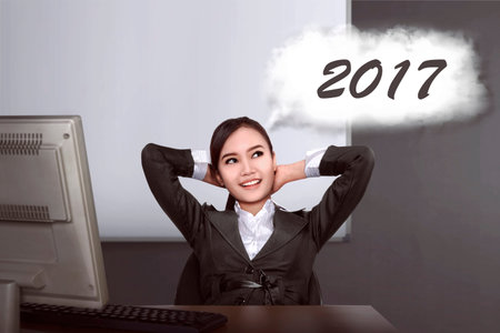 Asian business woman think about target in 2017. New year resolution concept