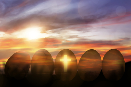 Cross light in the row golden egg at sunsetの写真素材