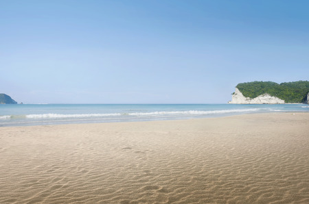 Landscape view of tropical beach with blue sea at sunny dayの写真素材