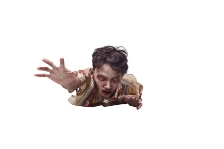 Spooky asian undead man crawling isolated over white backgroundの写真素材