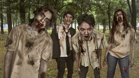 Portrait group of asian bloody zombies with wounded face in the woodsの写真素材