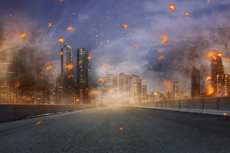 Portrait of disaster with fires and debris in the cityの写真素材