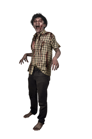 Portrait of creepy asian zombie man in clothes isolated over white backgroundの写真素材