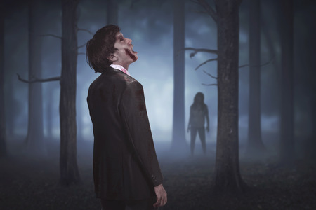 Scary asian zombies on the forest at nightの写真素材