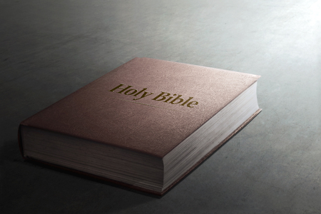Holy Bible on gray backgroundの写真素材