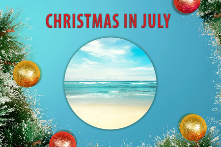 Colorful glitter decoration on Christmas in July with beach on the backgroundの写真素材