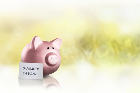 Note with text summer saving and piggy bank. Summer saving conceptの写真素材