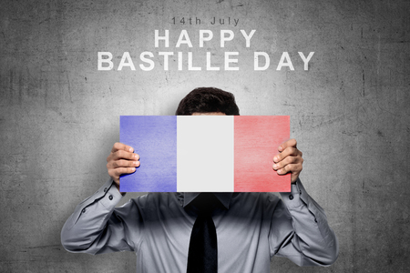 Businessman holding board with france flag color. Happy Bastille Day の写真素材