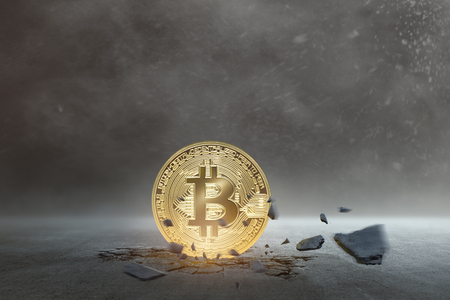 Golden bitcoin coin standing on the ground. Cryptocurrency conceptの写真素材