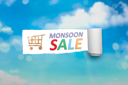 Ripped paper with text of Monsoon sale. Monsoon sale conceptの写真素材
