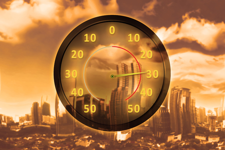 City with heat temperature on thermometer. Heat wave conceptの写真素材