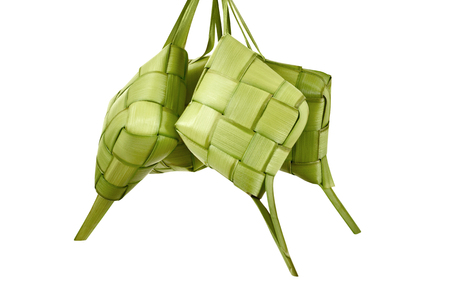 Ketupat is traditional food with unique pattern isolated over white backgroundの写真素材