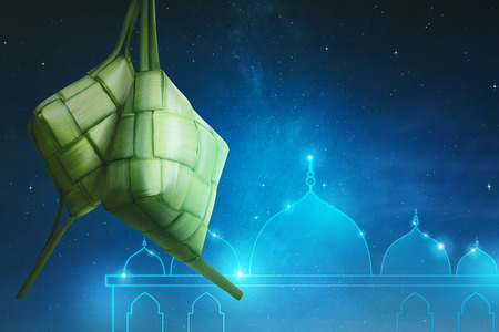 Rice dumpling (ketupat) with unique pattern over night backgroundの写真素材
