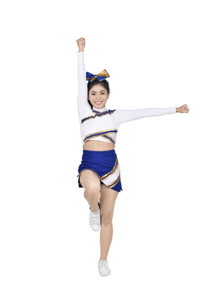 Images of asian cheerleader performing with white and blue suit posing isolated over white backgroundの写真素材