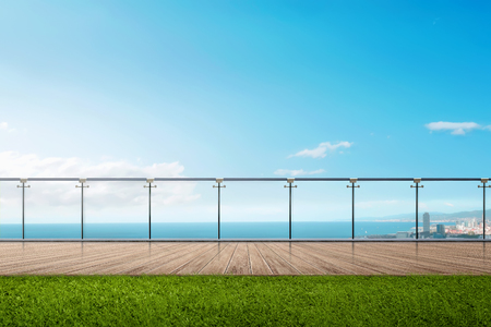 Seascape view with blue sky looking through from balconyの写真素材