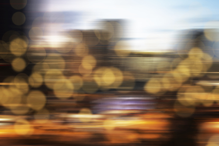 Colorful bokeh lamp on the city at nightの写真素材