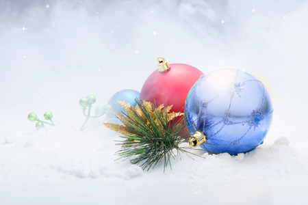 Colorful christmas balls and snowflake on winter background. Christmas ornamentの写真素材