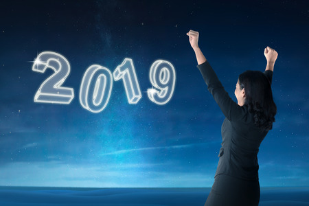 Happy asian businesswoman celebrate new year 2019. Happy New Year 2019の写真素材