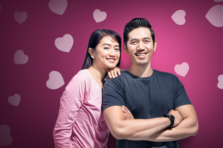 Happy asian couple with the woman head lean on the man shoulder. Love concept and Valentines dayの写真素材