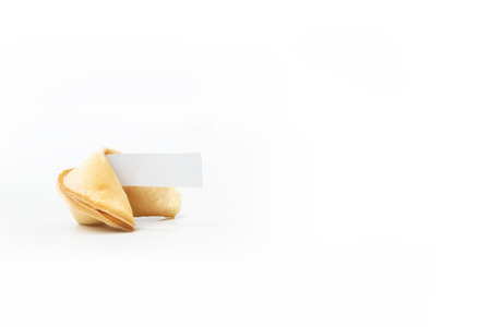 Fortune cookies with blank white paper isolated over white backgroundの写真素材