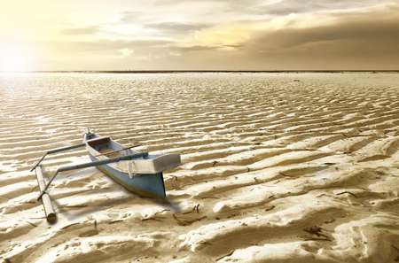 Boat on the dry ground. Climate change conceptの写真素材