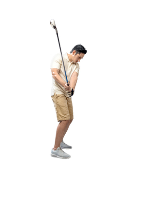 Handsome asian golf player man ready to swing a golf stick isolated over white backgroundの写真素材