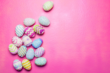 Colorful easter eggs on the pink background. Happy Easterの写真素材