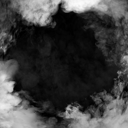 White smoke with black backgroundの写真素材