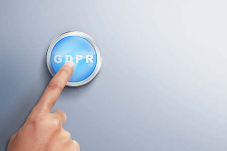 Hands press the GDPR button on the wall. Cyber security and privacy. General Data Protection Regulation (GDPR) conceptの写真素材