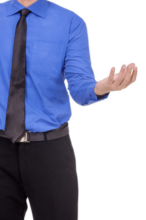 Businessman in formal wear standing with open palm for holding or showing something isolated over white backgroundの写真素材