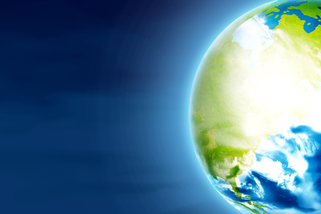 Glowing earth planet over night sky background. Earth hour conceptの写真素材