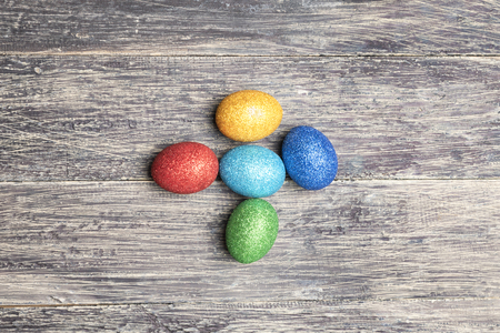 Colorful easter eggs on wooden table. Happy Easterの写真素材