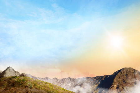 Panoramic views of top of the mountain with clouds fog on the morningの写真素材