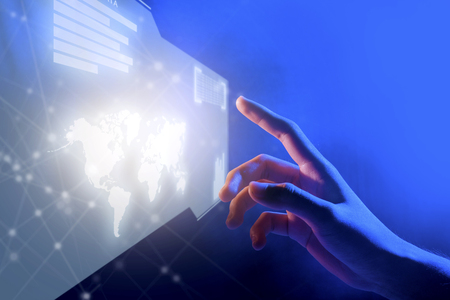 Business finger touching a virtual screen which display the interface of server data, world maps, graph and binary code with internet network background. Digital technology conceptの写真素材