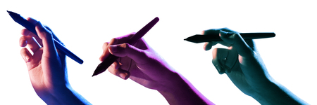 Male hand using black marker isolated over white backgroundの写真素材