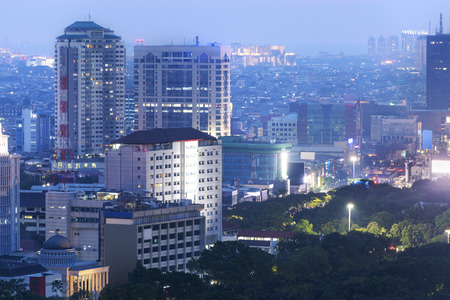 Jakarta city skyline with urban skyscrapers at night. Jakarta, Indonesiaの写真素材