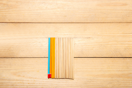 Row of stationery of pencils on the wooden table. Back to School conceptの写真素材