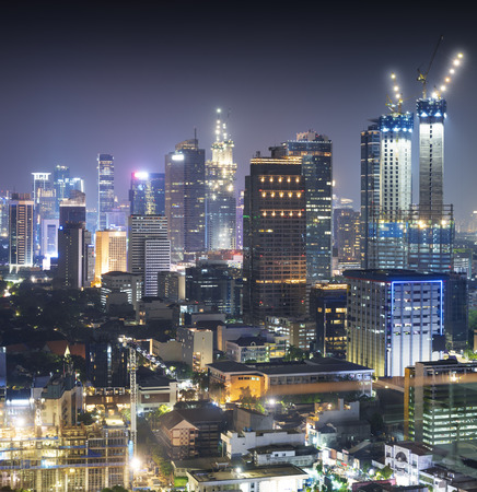 Jakarta city skyline with urban skyscrapers at night. Jakarta, Indonesiaの写真素材