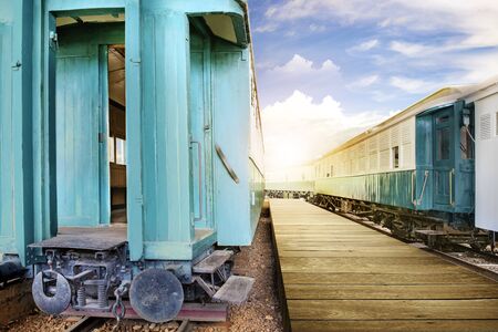 Train wagon in a station with blue sky backgroundの写真素材