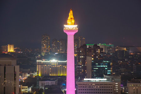 Jakarta city skyline with iconic symbol likes National Monument (Monas) at night. Jakarta, Indonesiaのeditorial素材
