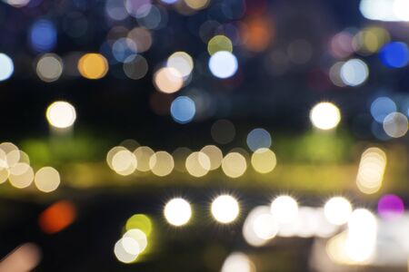 Jakarta city skyline with blurred lights at night. Jakarta, Indonesia