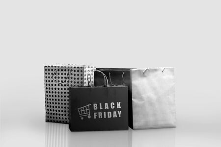 Pile of a shopping bag with Black Friday text. Black Friday conceptの写真素材
