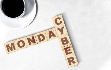 Cyber Monday text on the wooden cube on the desk. Cyber Monday conceptの写真素材